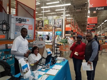 team with customers at home depot